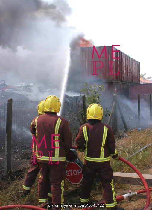 : Firefighters at scene of fire at Staples Corner : Firefighters at scene of fire at Staples Corner