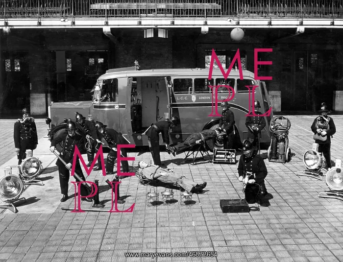 : Firefighters in training with various equipment : Firefighters in training with various equipment