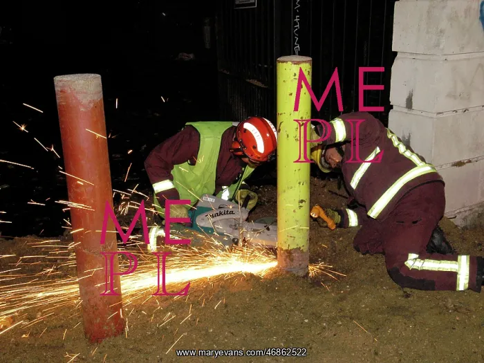 : Firefighters using cutting equipment, SE London : Firefighters using cutting equipment, SE London