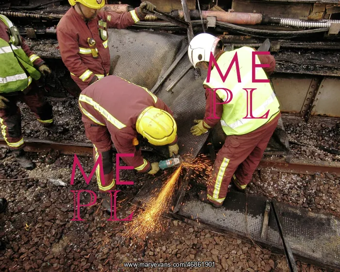 : Firefighters using cutting equipment, West London : Firefighters using cutting equipment, West London