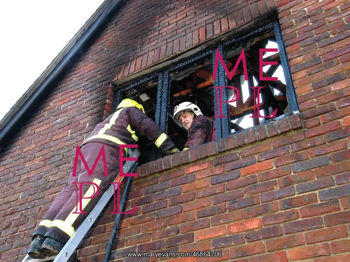 : Firefighters working at scene of domestic fire, Harrow : Firefighters working at scene of domestic fire, Harrow