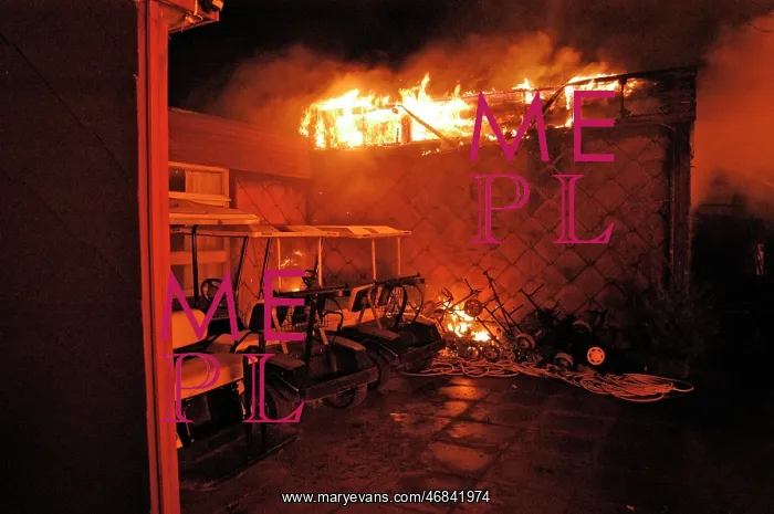 : Firefighters working at scene of fire in Carshalton, Surrey : Firefighters working at scene of fire in Carshalton, Surrey