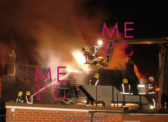 : Firefighters working at scene of restaurant fire : Firefighters working at scene of restaurant fire