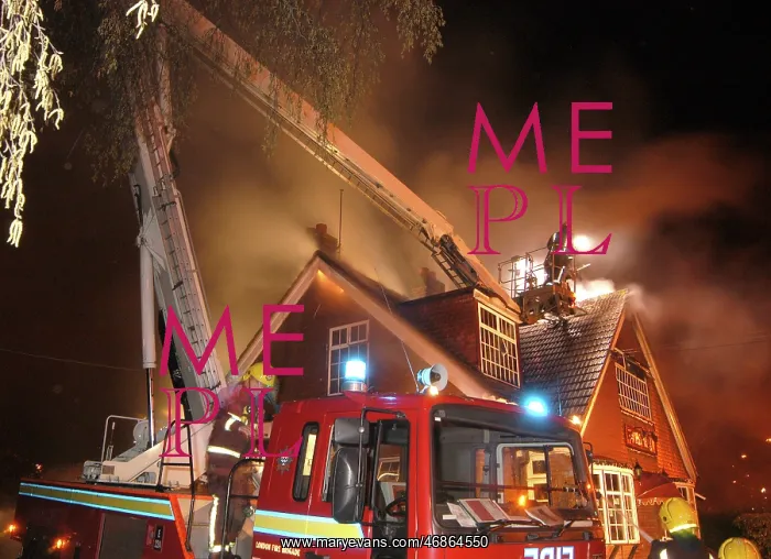 : Firefighters working at scene of restaurant fire : Firefighters working at scene of restaurant fire