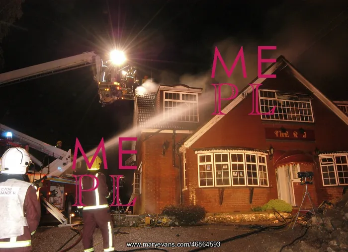 : Firefighters working at scene of restaurant fire : Firefighters working at scene of restaurant fire