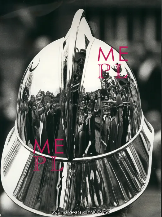 : Fireman's helmet mirrors people's assembly, Switzerland : Fireman's helmet mirrors people's assembly, Switzerland