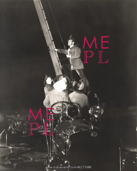 : Firemen raising ladder on firetruck : Firemen raising ladder on firetruck