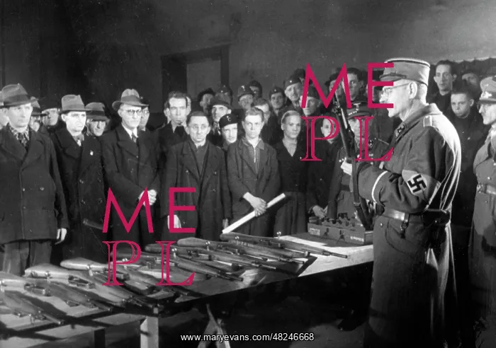 : The first conscripts in the Volkssturm get their weapons : The first conscripts in the Volkssturm get their weapons