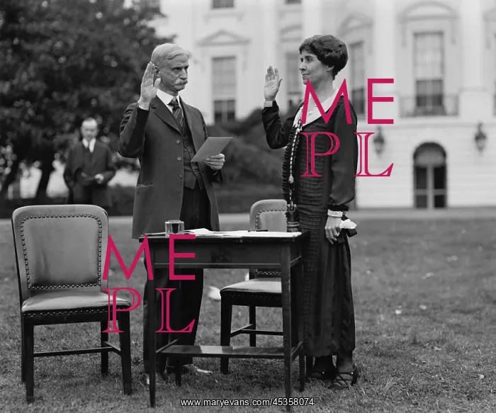 : First Lady Grace Coolidge taking an oath before : First Lady Grace Coolidge taking an oath before