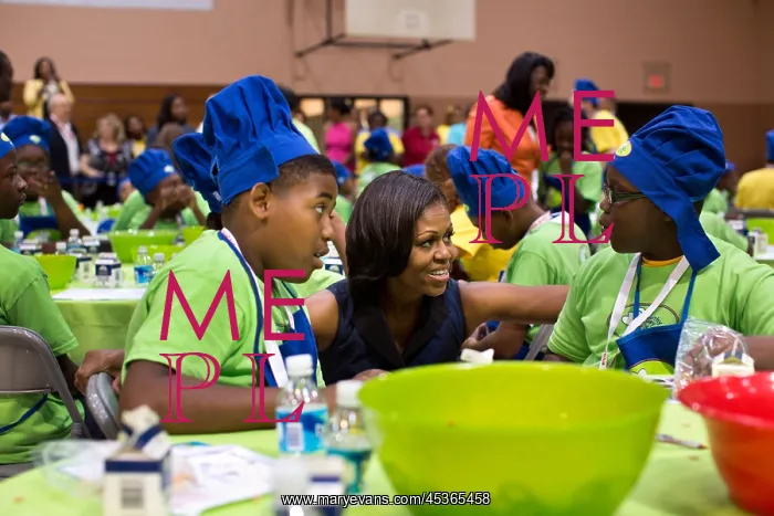 : First Lady Michelle Obama talks with kids making : First Lady Michelle Obama talks with kids making