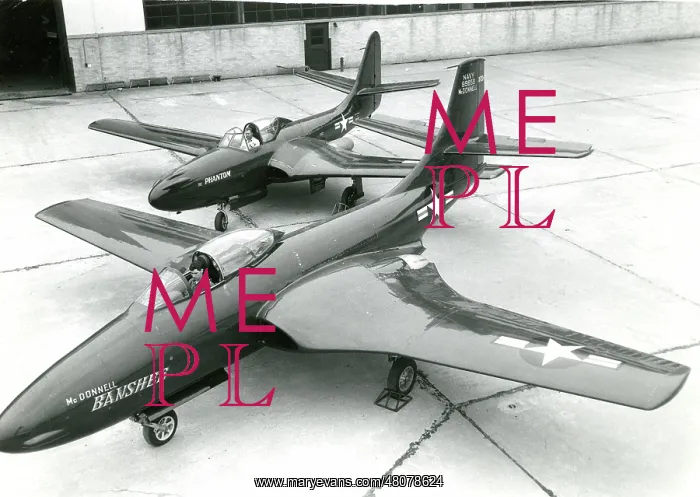 : The first McDonnell XFD-1 Phantom, 48235, behind its lar : The first McDonnell XFD-1 Phantom, 48235, behind its lar