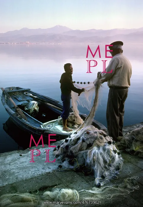 : Two fishermen sort their nets on stone quayside - Fetheye : Two fishermen sort their nets on stone quayside - Fetheye