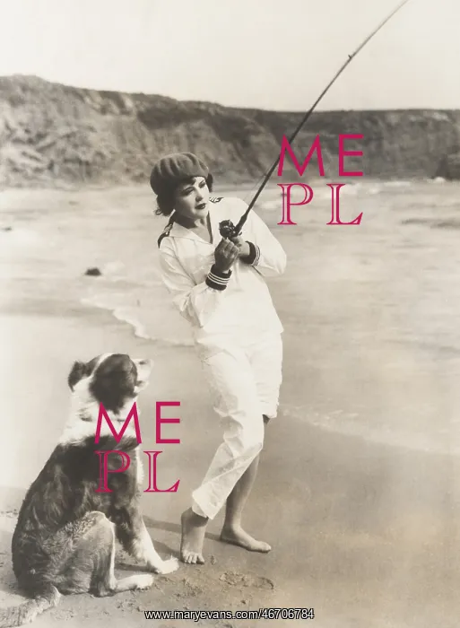  : Fishing at the beach with her dog