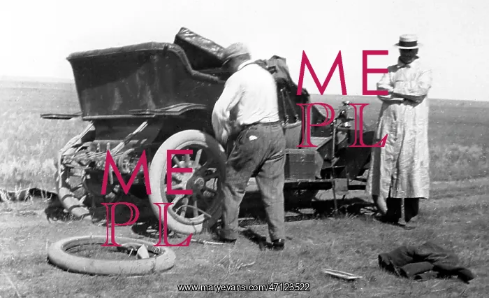  : Fixing a puncture, early 1900s
