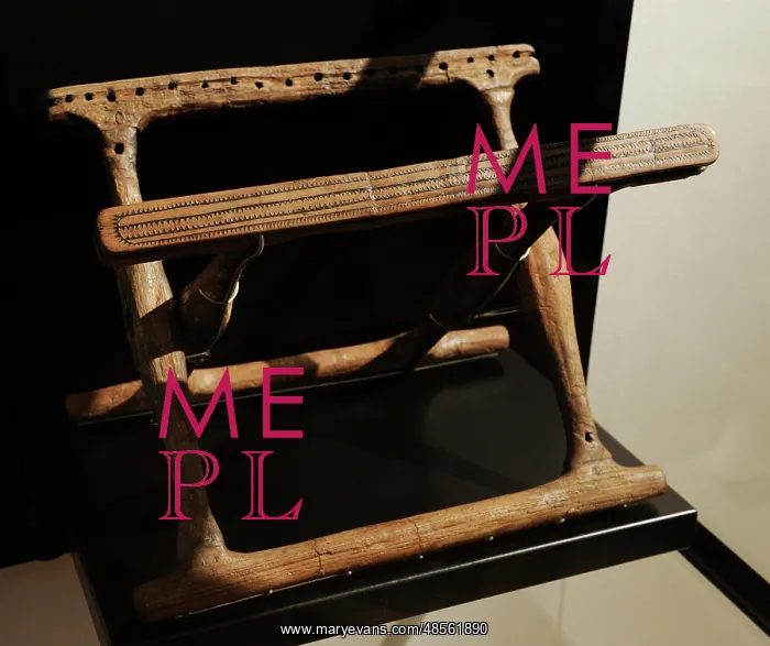 : Folding chair in ash wood. Second half of 1400 BC. Bronze Ag : Folding chair in ash wood. Second half of 1400 BC. Bronze Ag