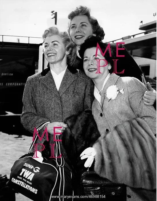: The Fontane Sisters standing at the airport : The Fontane Sisters standing at the airport