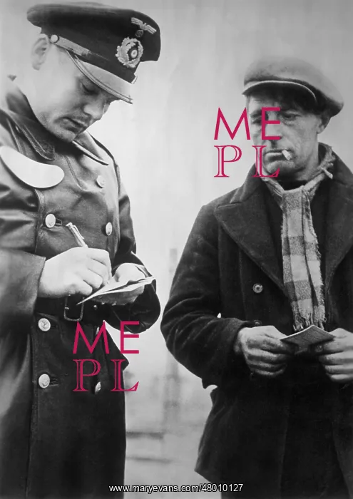 : Forced laborers at a passport control in Belgium, 1942 : Forced laborers at a passport control in Belgium, 1942