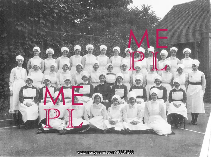 : Formal group of matron, nurses and sister outdoors : Formal group of matron, nurses and sister outdoors