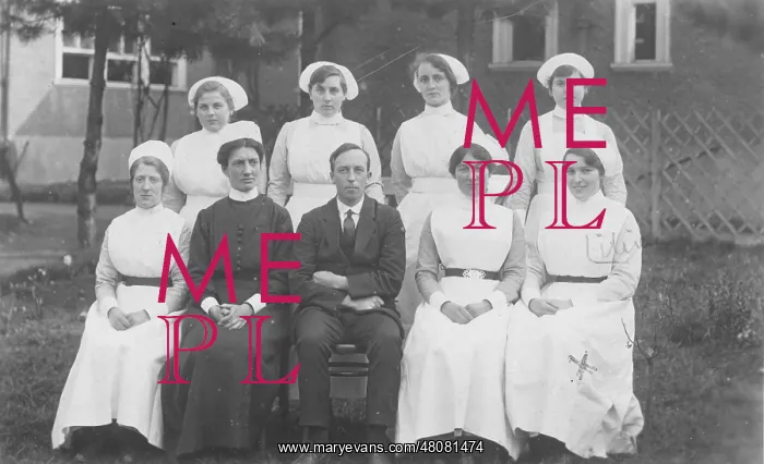 : Formal group photograph, six nurses, senior nurse, gentlema : Formal group photograph, six nurses, senior nurse, gentlema
