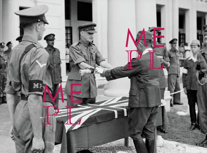 : Formal surrender by Japanese Generak Itagahi of his sword : Formal surrender by Japanese Generak Itagahi of his sword