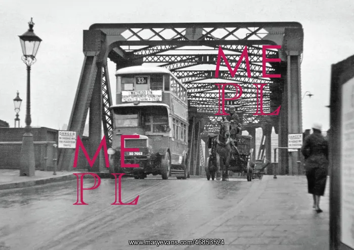 : Two forms of transport on a London bridge : Two forms of transport on a London bridge
