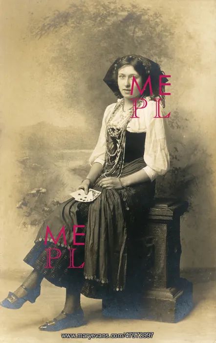 : A fortune teller posing with a handful of cards : A fortune teller posing with a handful of cards