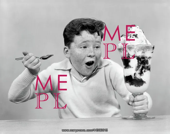 : Freckle face boy digging into giant ice cream : Freckle face boy digging into giant ice cream