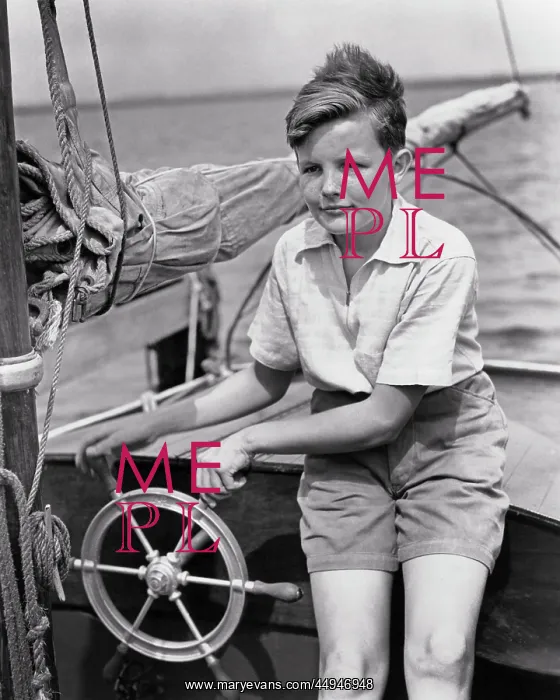 : Freckle-Faced Boy Sitting at Steering Wheel of : Freckle-Faced Boy Sitting at Steering Wheel of