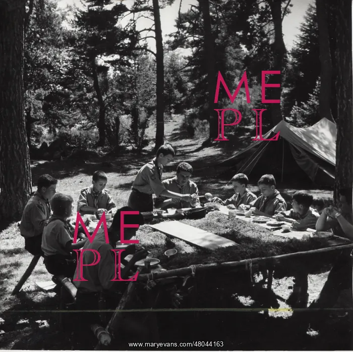 : French boy scouts enjoying meal at camp : French boy scouts enjoying meal at camp