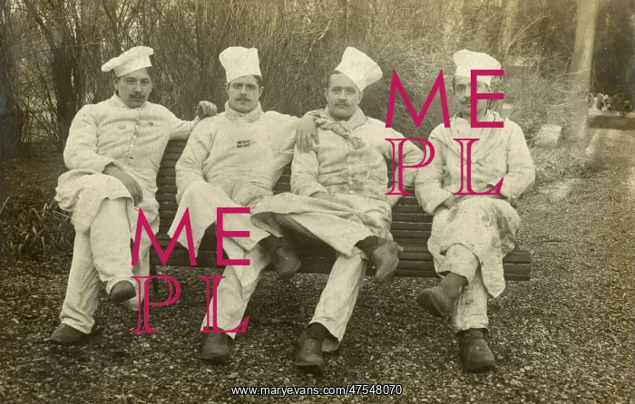  : Four French chiefs sitting on a bench
