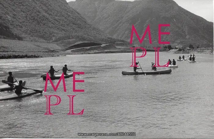 : French scouts canoeing during a camping trip : French scouts canoeing during a camping trip