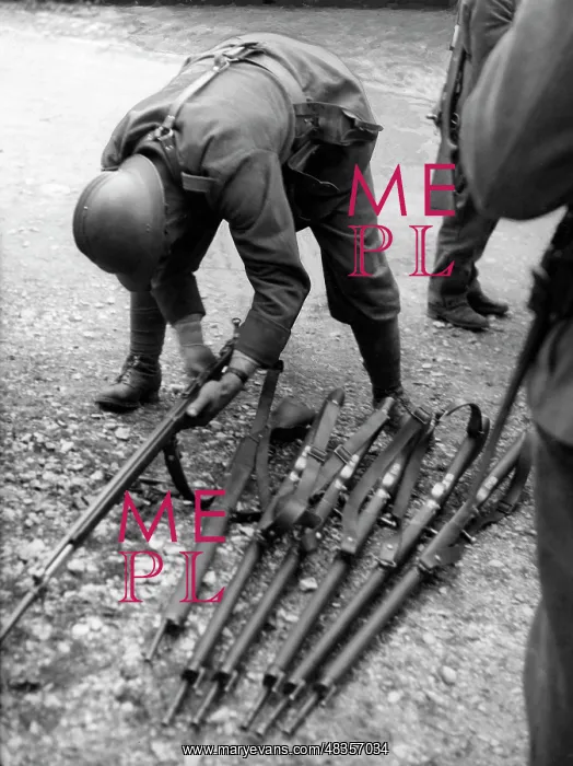 : French soldiers hand off their weapons, 1940 : French soldiers hand off their weapons, 1940