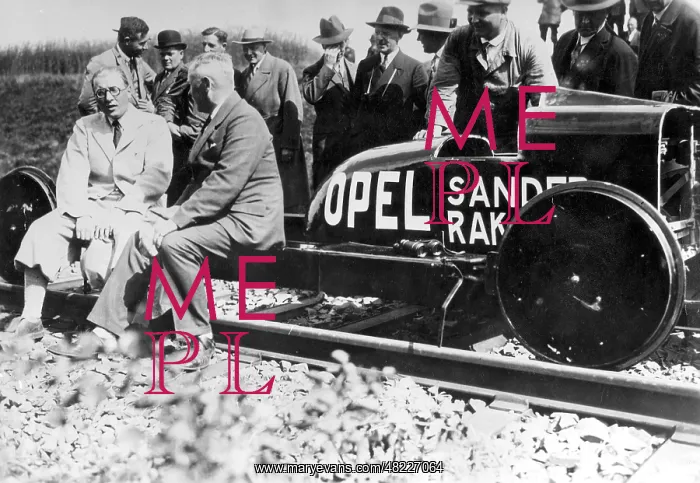 : Fritz von Opel in front of his rocket car, 1928 : Fritz von Opel in front of his rocket car, 1928