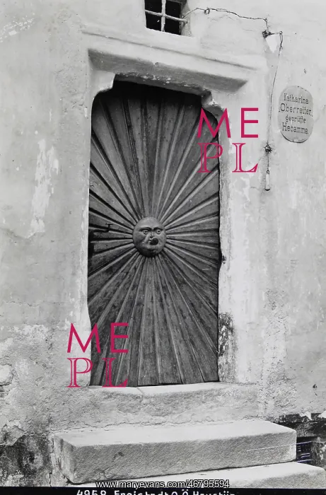 : Front-door with carved sun : Front-door with carved sun