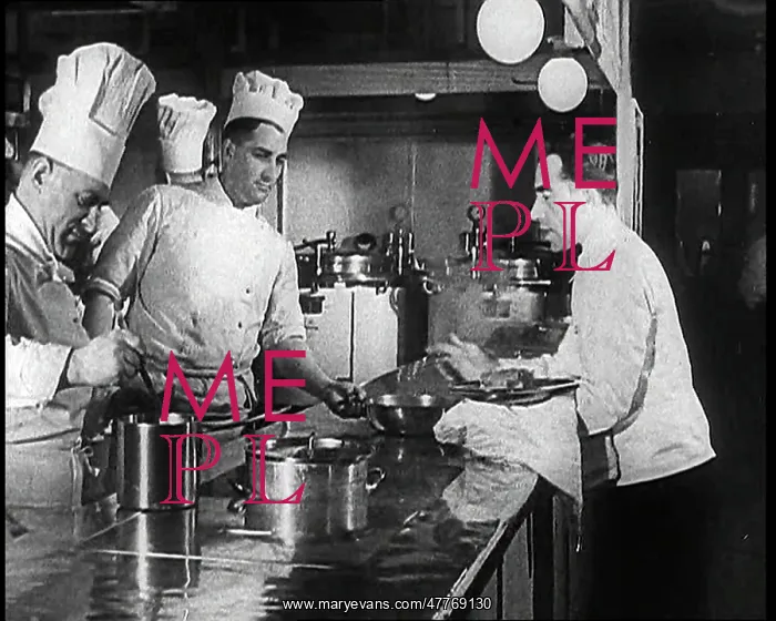 : A Galley With Kitchen Staff Cooking and Waiters : A Galley With Kitchen Staff Cooking and Waiters