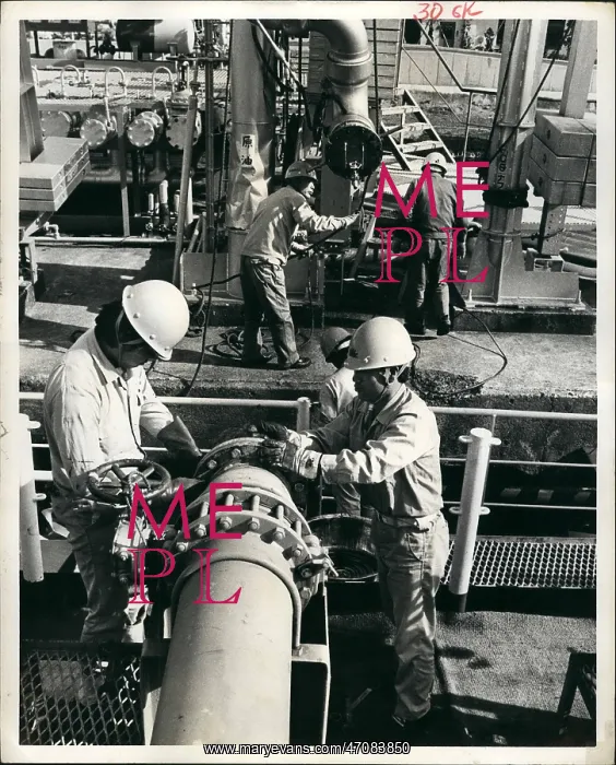 : Gas - Oil. 1979 - Workers prepare to unload crude oil into storage tanks : Gas - Oil. 1979 - Workers prepare to unload crude oil into storage tanks