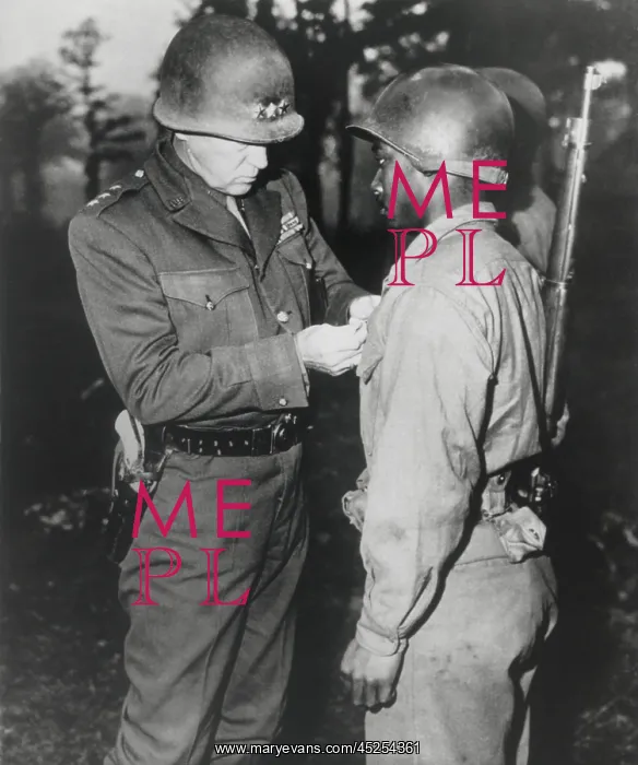 : Gen. George Patton, pins the Silver Star on Private : Gen. George Patton, pins the Silver Star on Private