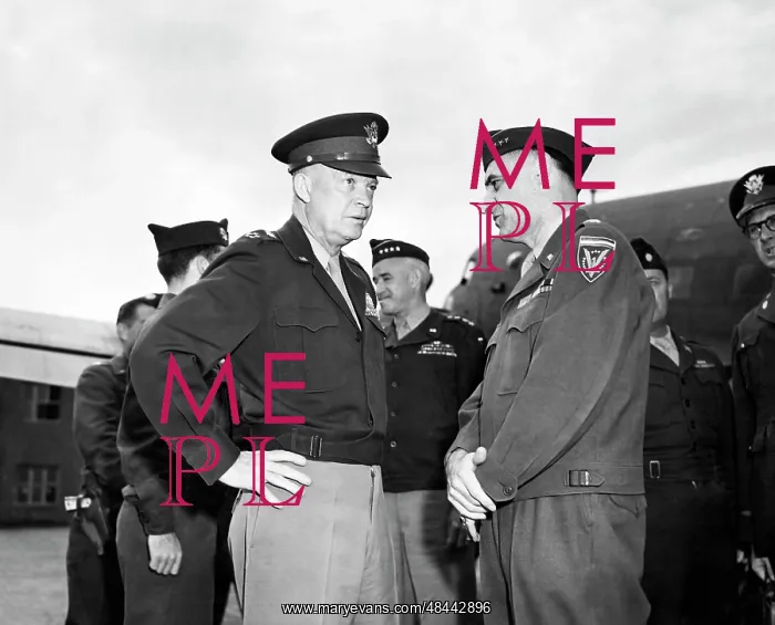 : General Dwight Eisenhower talking with General : General Dwight Eisenhower talking with General