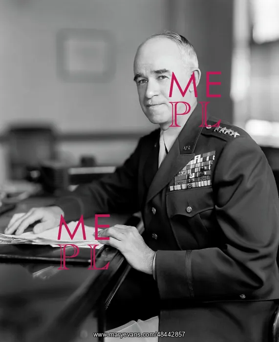  : General Omar Bradley sitting at a desk, dated 1945