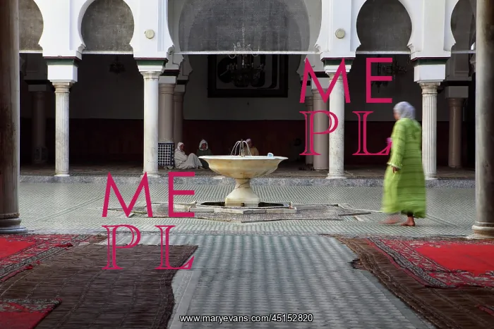 : Fez. General view of central courtyard with fountain : Fez. General view of central courtyard with fountain