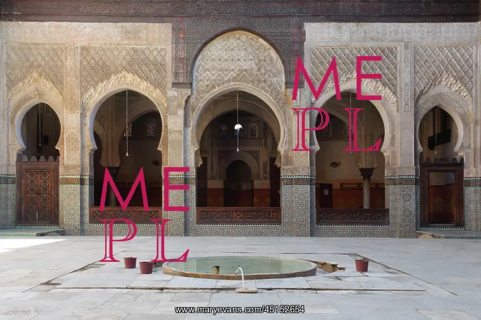 : Fez. General view of central courtyard with prayer area in the background : Fez. General view of central courtyard with prayer area in the background