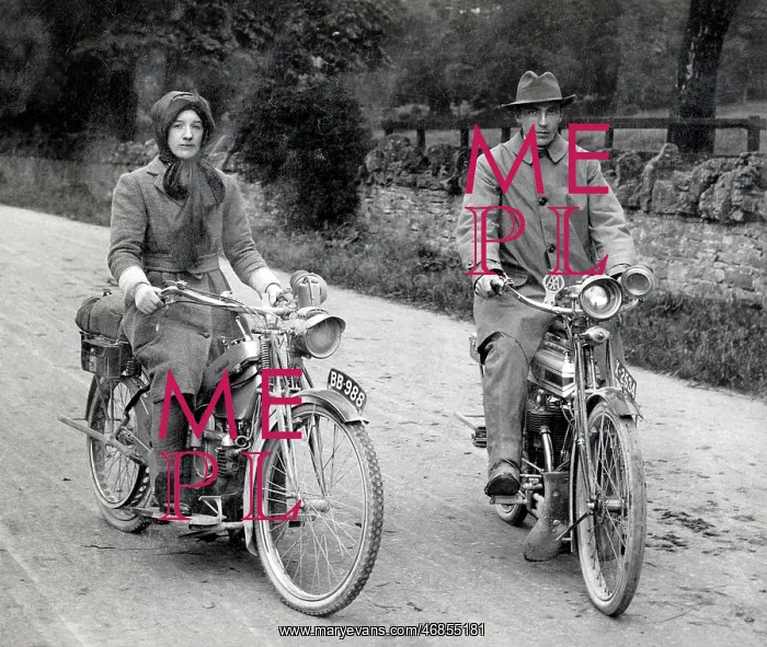 : Gentleman & lady posed on their 1910 motorcycles : Gentleman & lady posed on their 1910 motorcycles