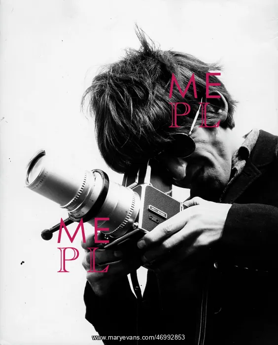: George Harrison of The Beatles pop group with camera : George Harrison of The Beatles pop group with camera