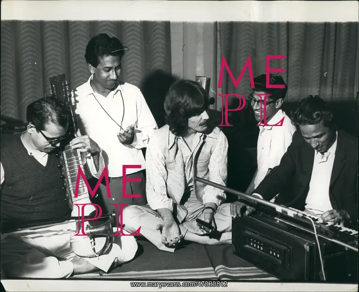 : George Harrison with Indian musicians : George Harrison with Indian musicians