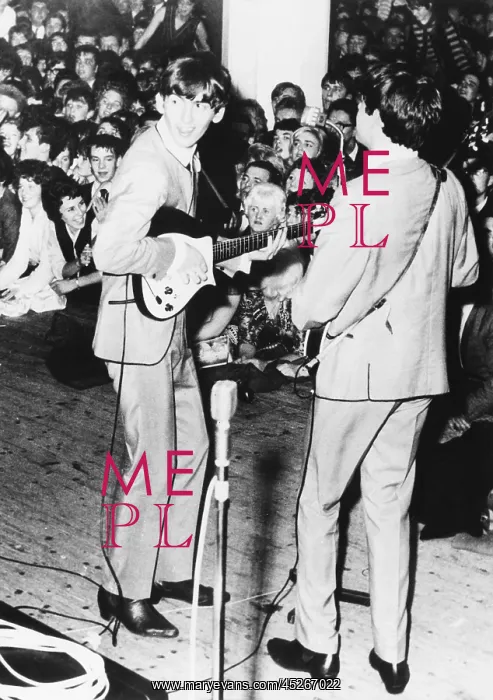 : George Harrison (left) and Paul McCartney, of the : George Harrison (left) and Paul McCartney, of the