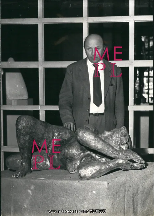 : Georges Muguet with his sculpture, Paris : Georges Muguet with his sculpture, Paris