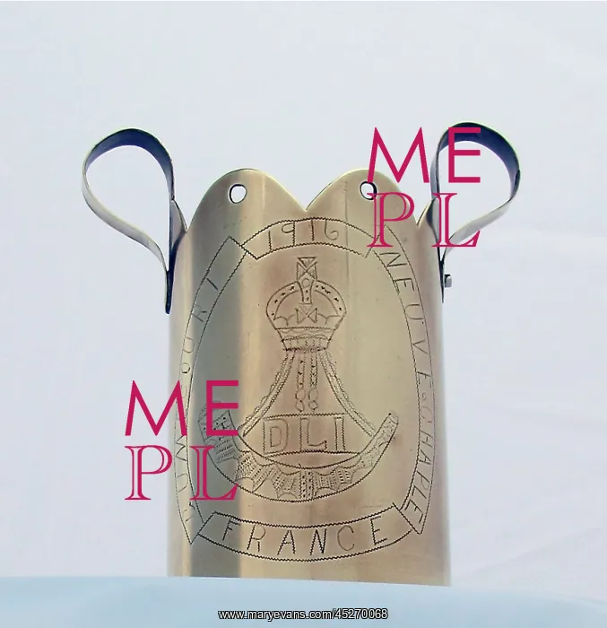 : German 77mm shell case vase with looped handles : German 77mm shell case vase with looped handles