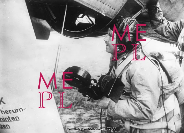 : German cameraman when boarding in an aircraft of the Luftwaf : German cameraman when boarding in an aircraft of the Luftwaf