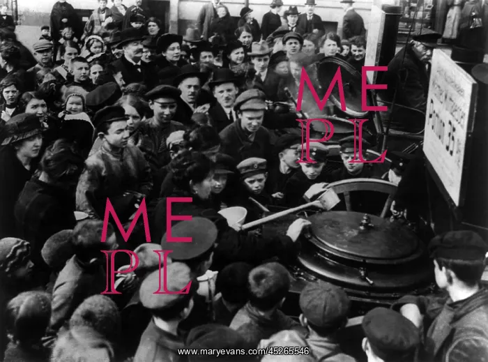 : German civilians crowding around soup pots in : German civilians crowding around soup pots in