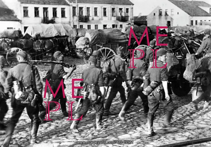 : German infantry marching through a Russian city, 1941 : German infantry marching through a Russian city, 1941